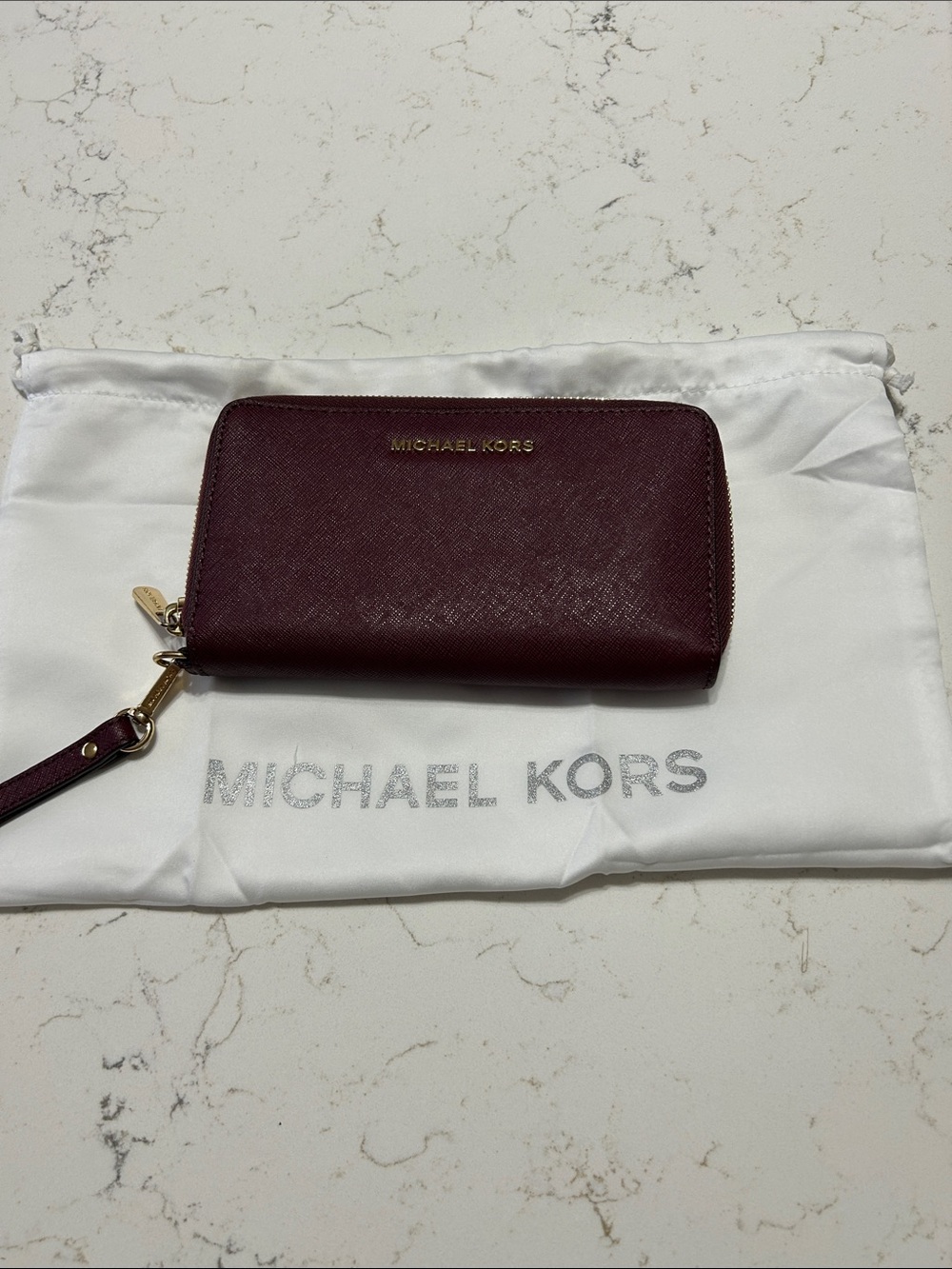Michael Kors Plum Saffiano Wristlet Wallet with Gold Logo and dusty